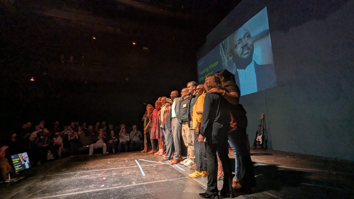 The DisruptHR Charlottesville speakers lined up on stage at Live Arts in front of an applauding audience